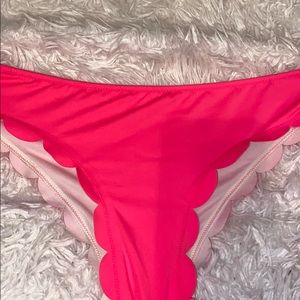 Pink ruffled swim bottoms, super cute.